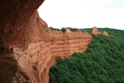 Scenic view of cliff against sky
