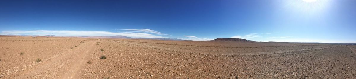 Scenic view of desert against sky