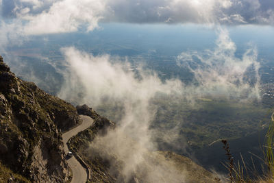 Road on mountain by sea