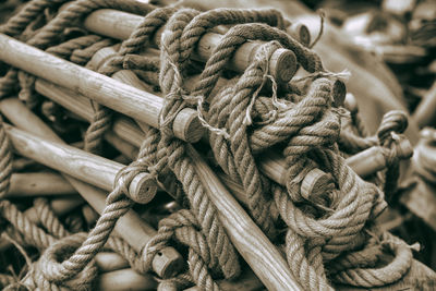 Close-up of rope tied on wooden post