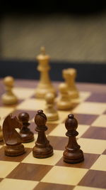 Close-up of chess on table