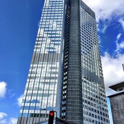 Low angle view of modern building against sky