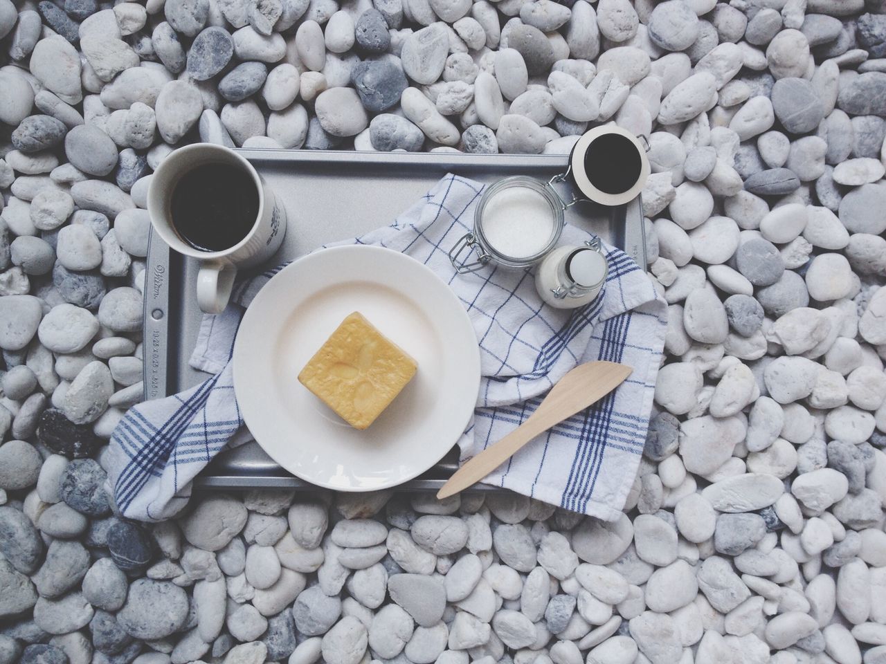 food and drink, still life, food, freshness, high angle view, large group of objects, table, coffee - drink, coffee cup, directly above, healthy eating, abundance, drink, refreshment, pebble, bowl, spoon, no people, breakfast, indoors