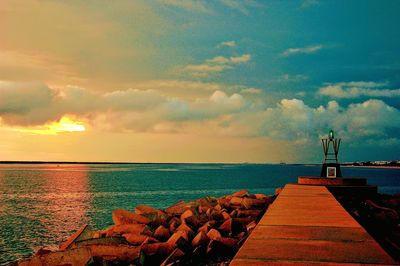 Scenic view of sea against sky during sunset