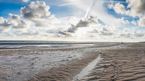 Panoramic view of beach against sky