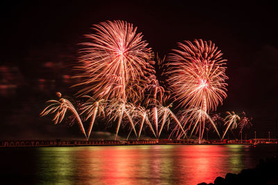 Photograph of fireworks at night, long exposure magical effect.