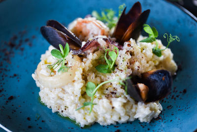 Tasty italian risotto with seafood and spices