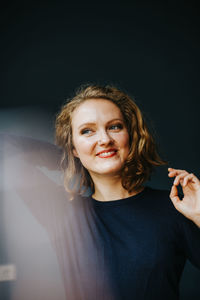 Portrait of a smiling young woman