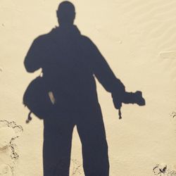 Shadow of people on sand