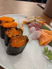 High angle view of sushi served on table