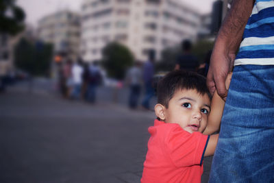 Close-up of a man holding toddler