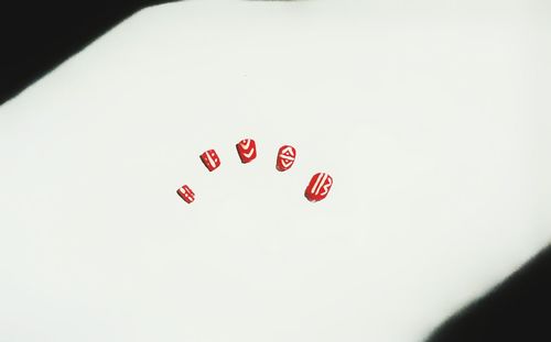 Close-up of red heart shape on table