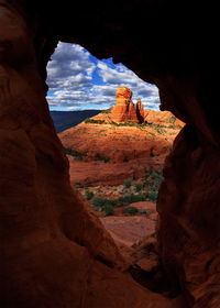 View of landscape against cloudy sky