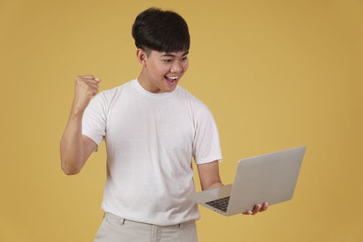 Young man using mobile phone