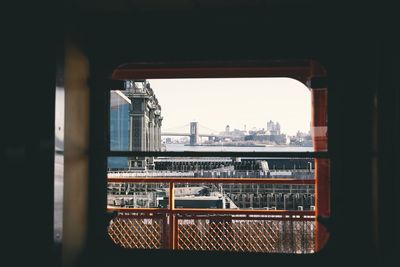 Brooklyn bridge seen through window