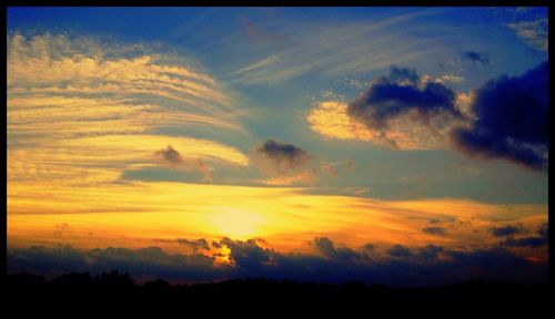 Scenic view of landscape at sunset