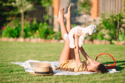 Woman lying on grass