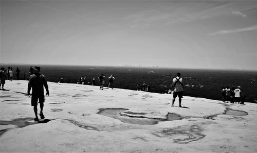 People walking on beach