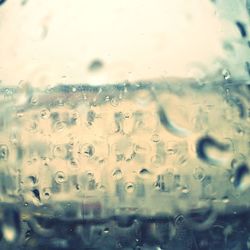 Close-up of water drops on glass