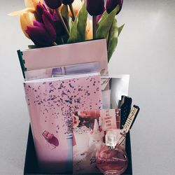 Close-up of pink flower vase on table