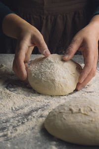 Close-up of person preparing food