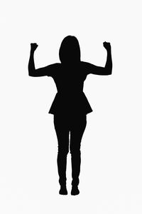 Rear view of silhouette woman standing against white background