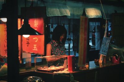 Woman in asian restaurant