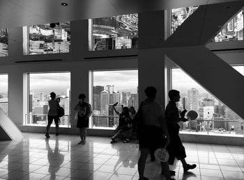 People walking in modern building