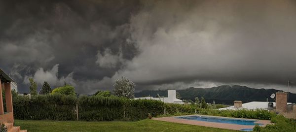 Scenic view of landscape against cloudy sky