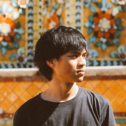 Close-up portrait of serious young man
