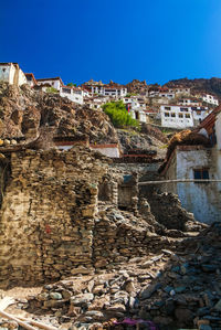 View of built structures against clear sky