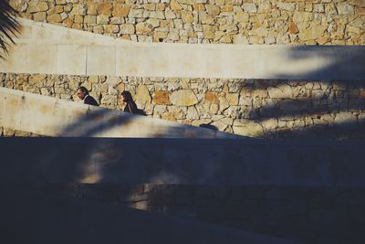 Shadow of people on wall