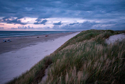 Scenic view of beach against sky