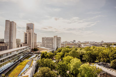 High angle view of railroad tracks amidst buildings in city