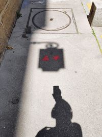 High angle view of shadow on street