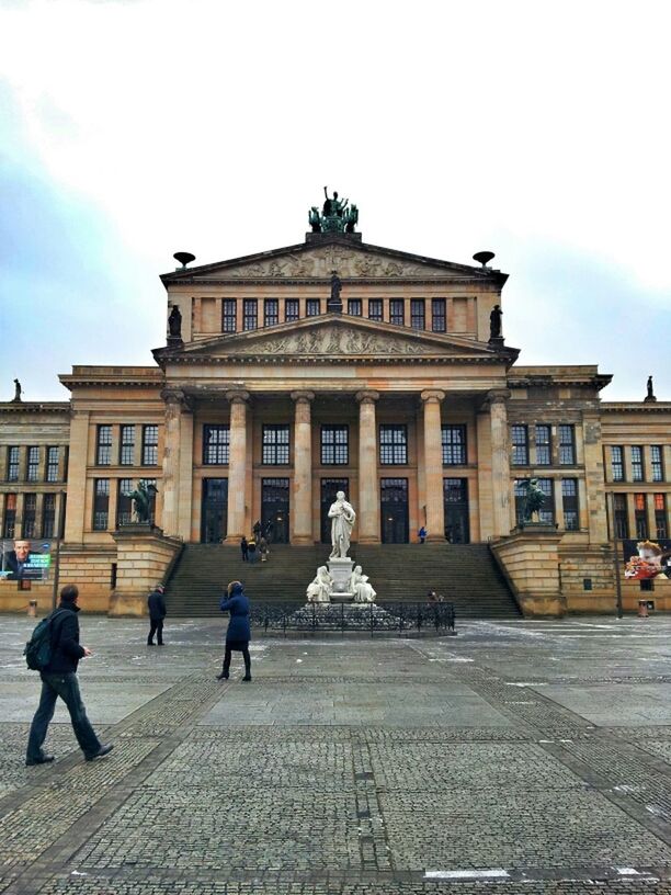 architecture, building exterior, built structure, statue, sculpture, art and craft, famous place, architectural column, human representation, art, travel destinations, tourism, history, sky, facade, creativity, travel, town square, city