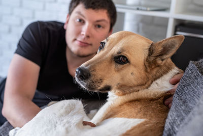 Portrait of man with dog