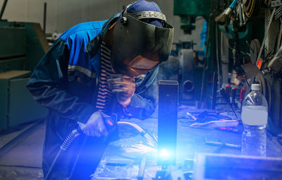 Man welding in factory