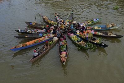 High angle view of people in boat on river