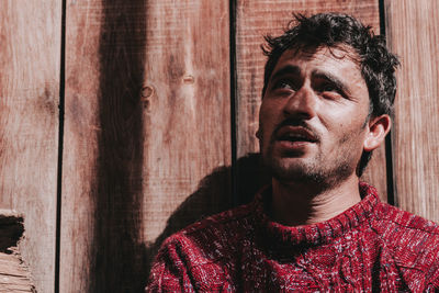 Portrait of young man looking away