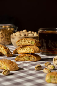 Biscotti cantuccini cookie biscuits with pistachios and lemon peel shortbread. cup of tea. teatime