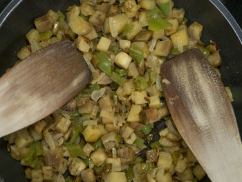 High angle view of chopped vegetables in cooking pan