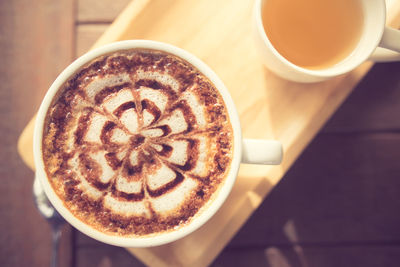 High angle view of cappuccino on table