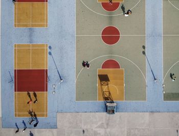 High angle view of basketball court and tennis court