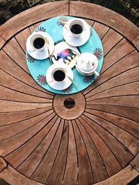 High angle view of coffee cup on table