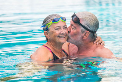 Portrait of smiling man in swimming pool