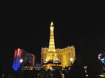 Low angle view of illuminated eiffel tower at night