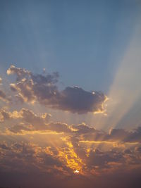 Low angle view of dramatic sky during sunset