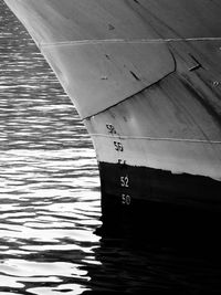 High angle view of text on wood by lake