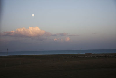 Scenic view of sea against sky at sunset